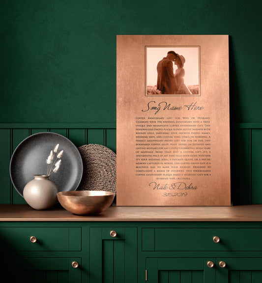 One of Honeycomb Proverbs top requested portrait gifts, a copper plaque with custom portrait and song sits beside a vase and copper bowl against a bold green backdrop. The portrait occupies the upper portion of the plaque, and the song title and song lyrics of choice sit below. A dedication at the bottom of names and date complete this personalized keepsake. This piece features a rustic casual calligraphy style inscription for the title and dedication.
Photo courtesy of Honeycomb Proverbs