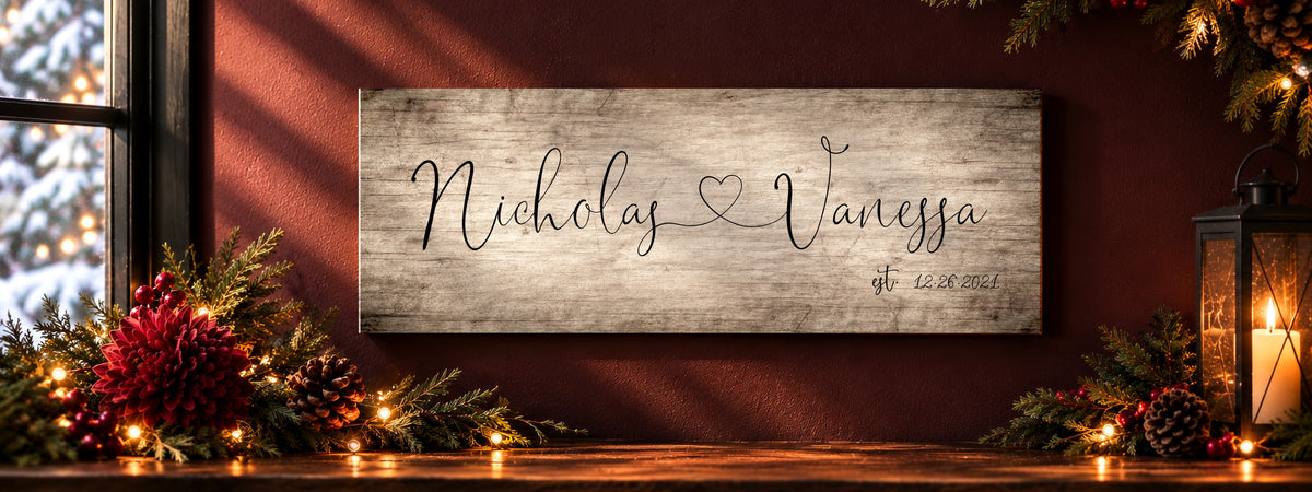 Personalized Nicholas and Vanessa wood name sign with holiday greenery and lights