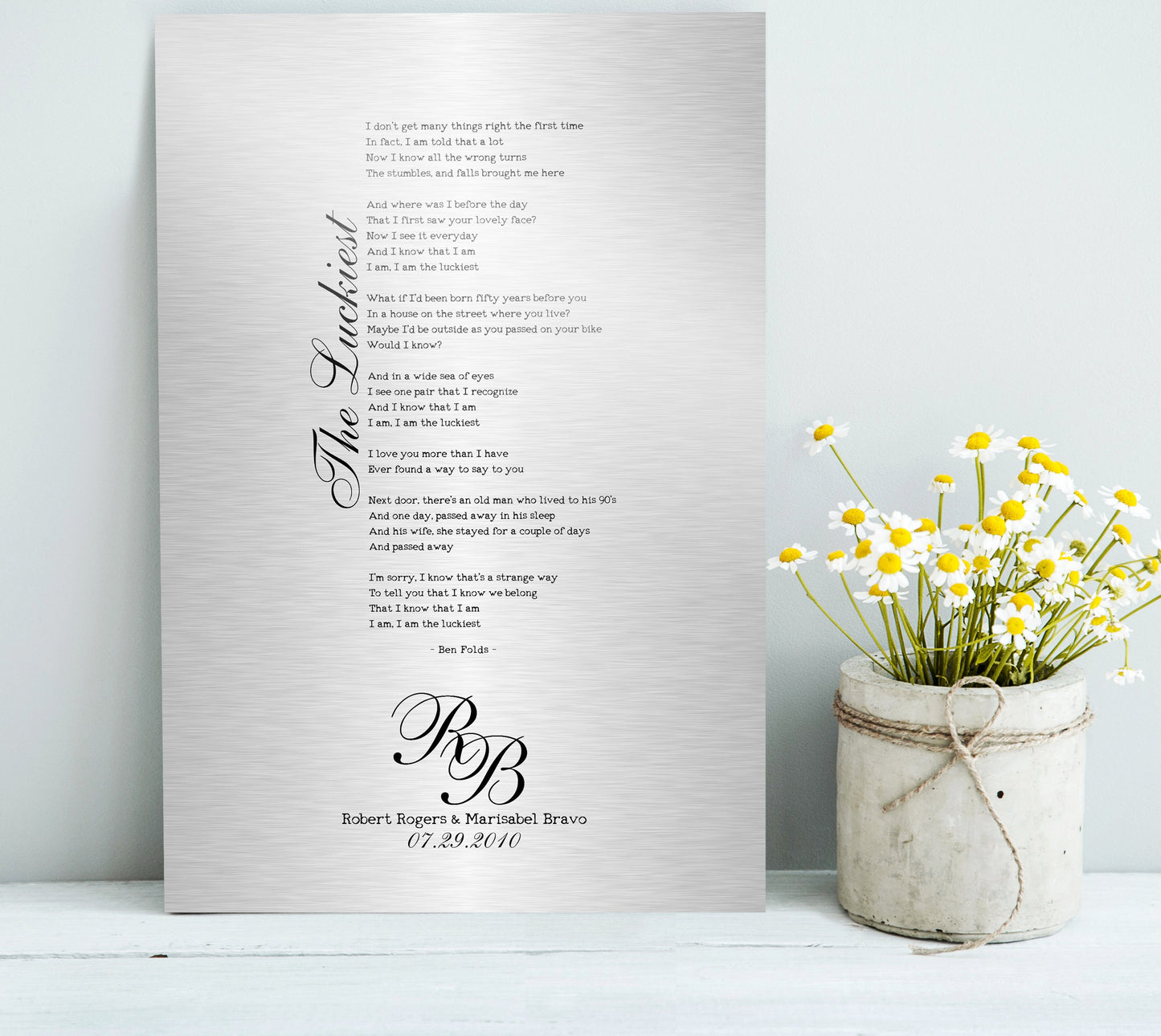 Luxury anniversary keepsake for couples to display their wedding song or first dance lyrics. A traditional 10th anniversary gift, a favorite song gift on tin, the perfect thoughtful 10th wedding anniversary present, features the song lyrics of choice in a vintage typeface and the song title or song excerpt running along side the justified lyrics in an elegant script. Perfectly punctuated with the names and union date, with a lovely monogram letter