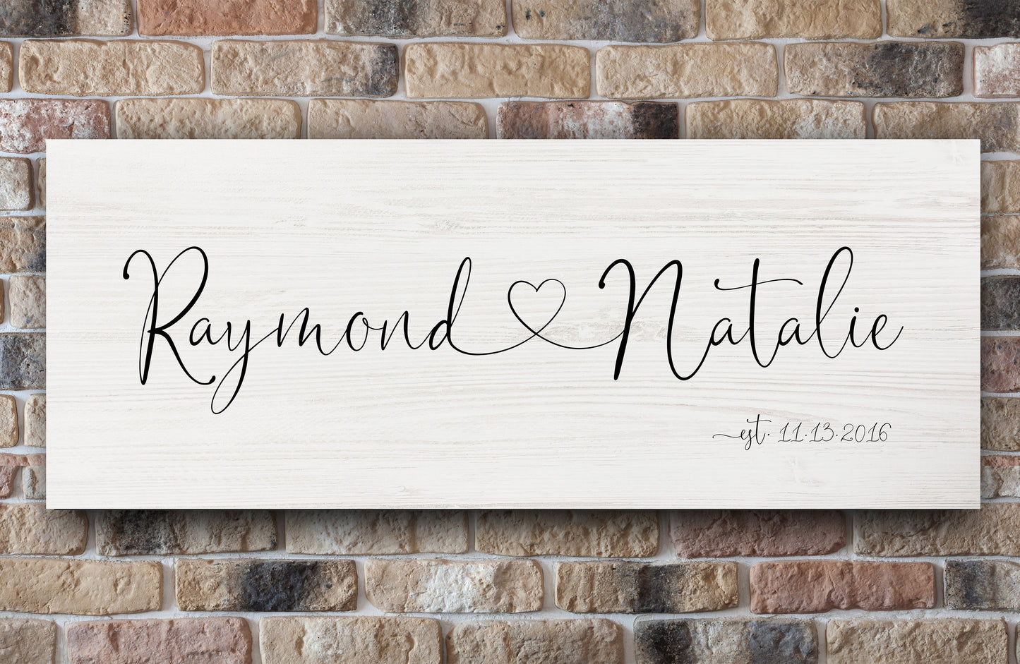 custom made established date signs with names connected by heart, shown in "white-wash"