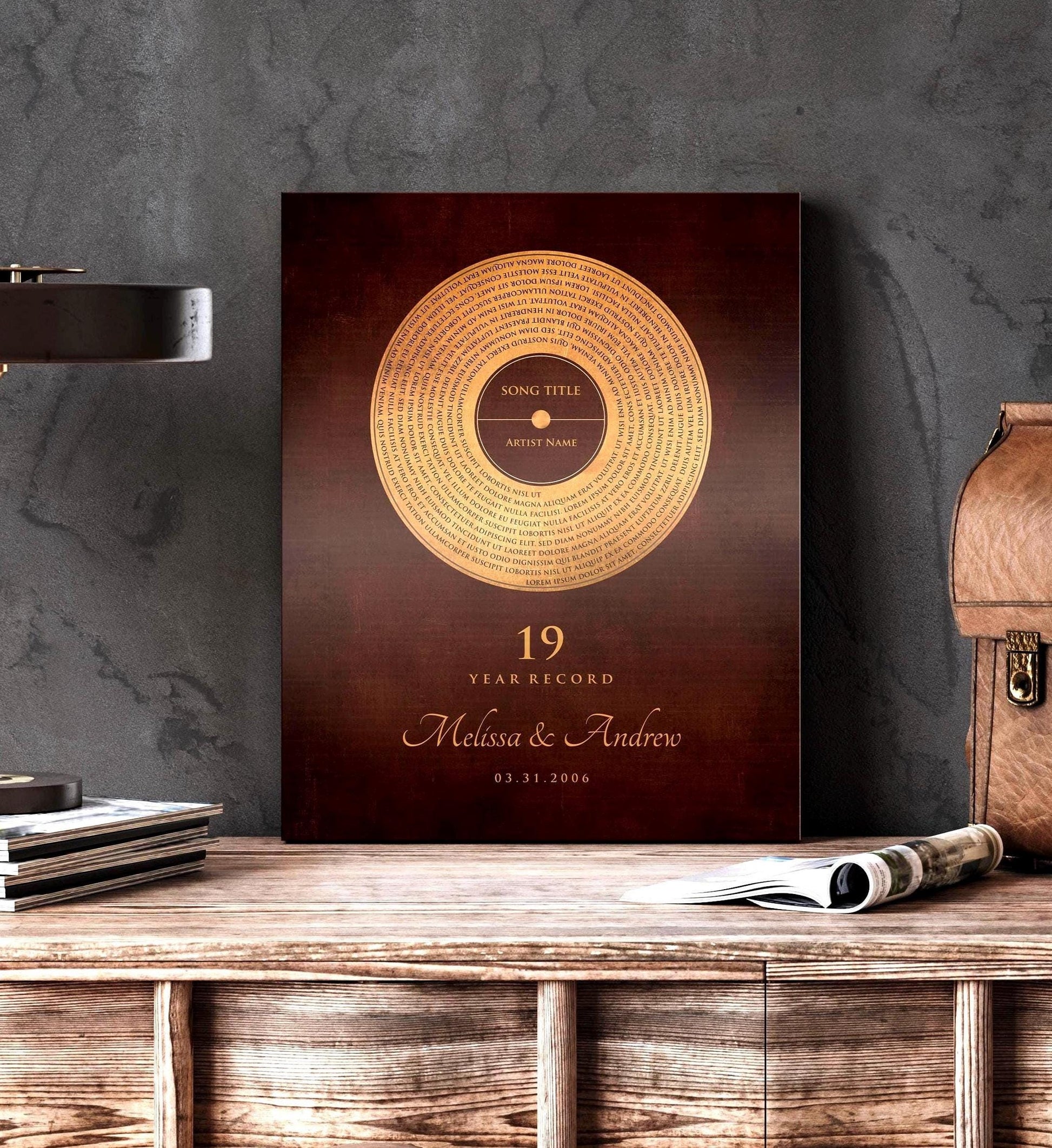 Bronze metal song record art. Custom lyrics vinyl record. On the wooden desk.