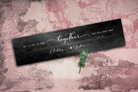 Wedding gifts for the couple like this personalized couple's bible verse wall decor, express faith and love with the delicate inscription of Ecclesiastes 4:11 framing a calligraphic arrangement of first names surrounding a heart motif. Sign featured is also on the distressed iron finish, making it the perfect iron anniversary gift idea for her. The sign is resting on a pink concrete floor with a sprig of ivy.

Photo courtesy of Honeycomb Proverbs