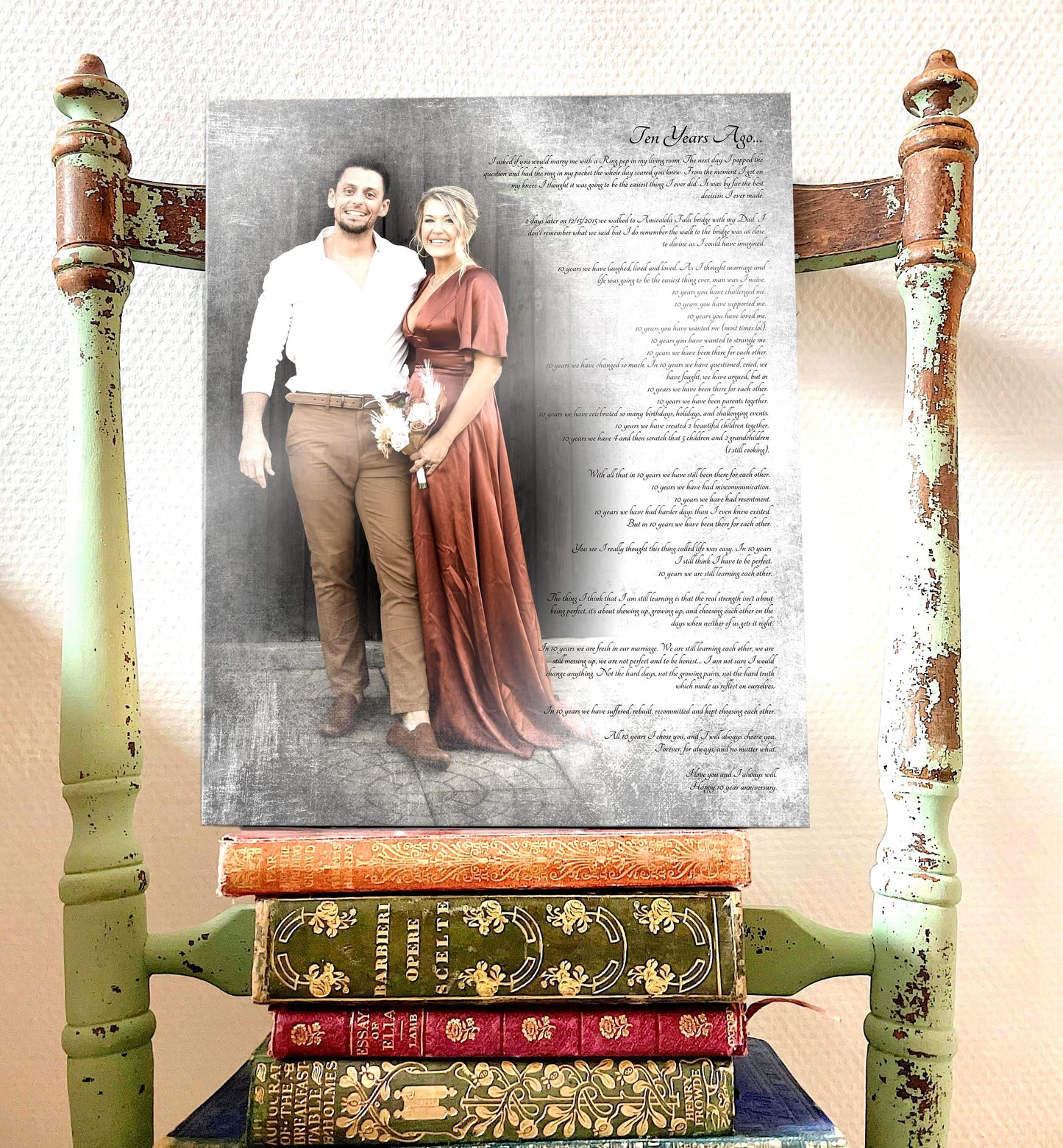 A metal photo plaque on tin - Honeycomb Proverbs' Vintage Photo Art is balanced on a stack of books sitting on the seat of an antique wood chair. The plaque features a couple with a personalized inscription running along the right side of the photo which fades into the tarnished metal.
Photo courtesy of Honeycomb Proverbs