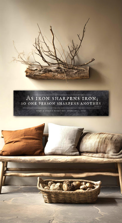 Distressed iron sign with Proverbs 27:17 "As iron sharpens iron" in silver on dark wrought iron finish, 6th anniversary