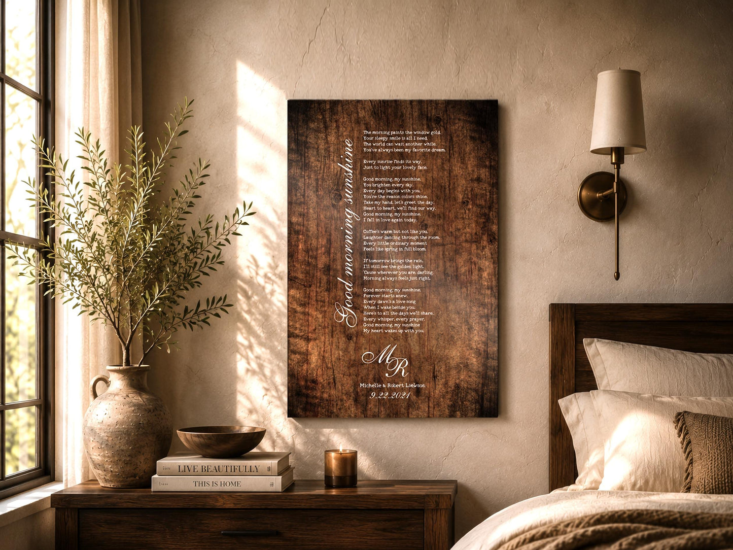 5 year anniversary song plaque for couples personalized with their initials, names, wedding date and the song lyrics of choice. Custom piece shown in the Stained birch finish and hung on a wall in a stylish bedroom setting with sunlight spilling through the window.