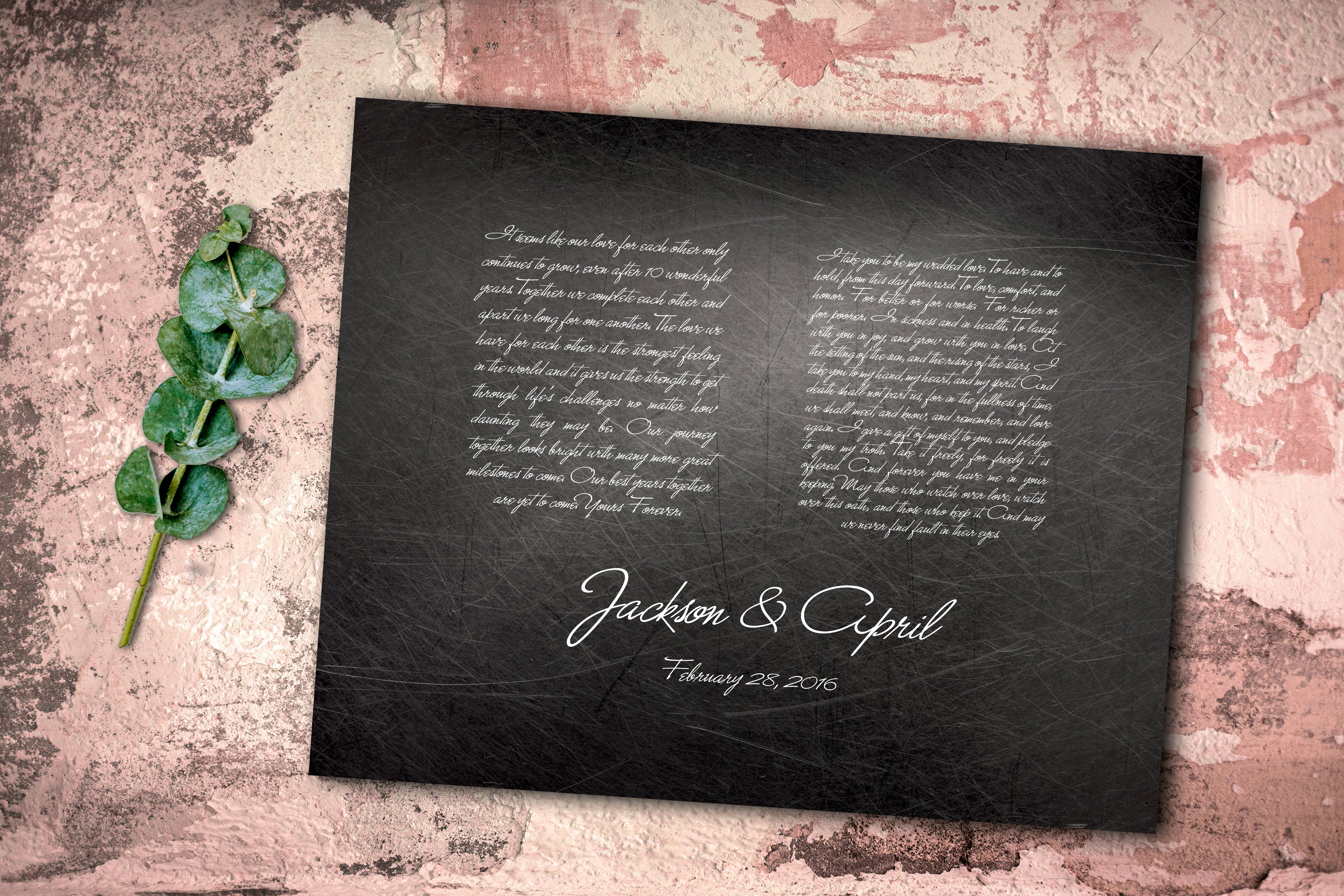 Horizontal black iron alloy plaque with inscribed with 2 wedding vows  in side by side columns and 'Jackson & April' with their wedding date beneath the names